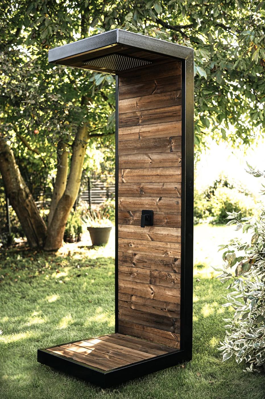 Outdoor shower in the garden — steel frame and thermowood