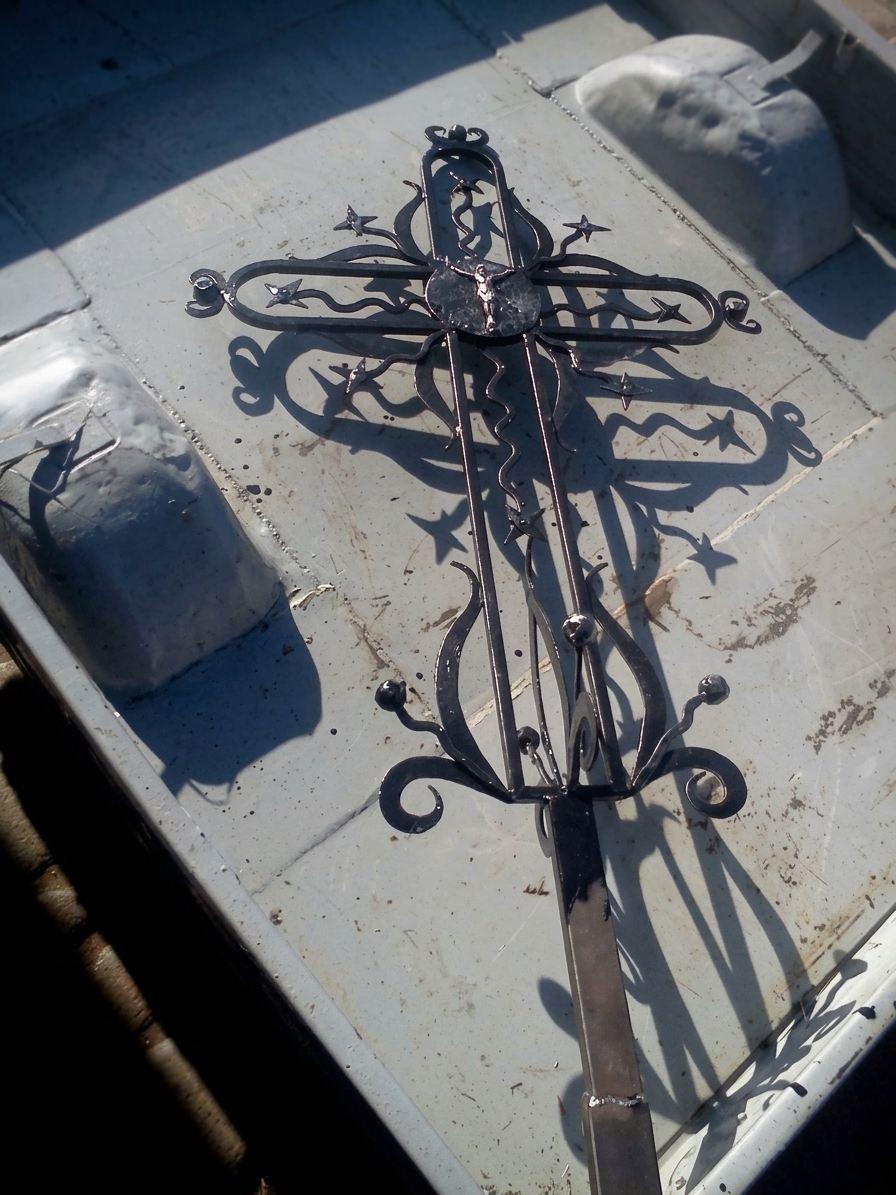 Openwork forged cross