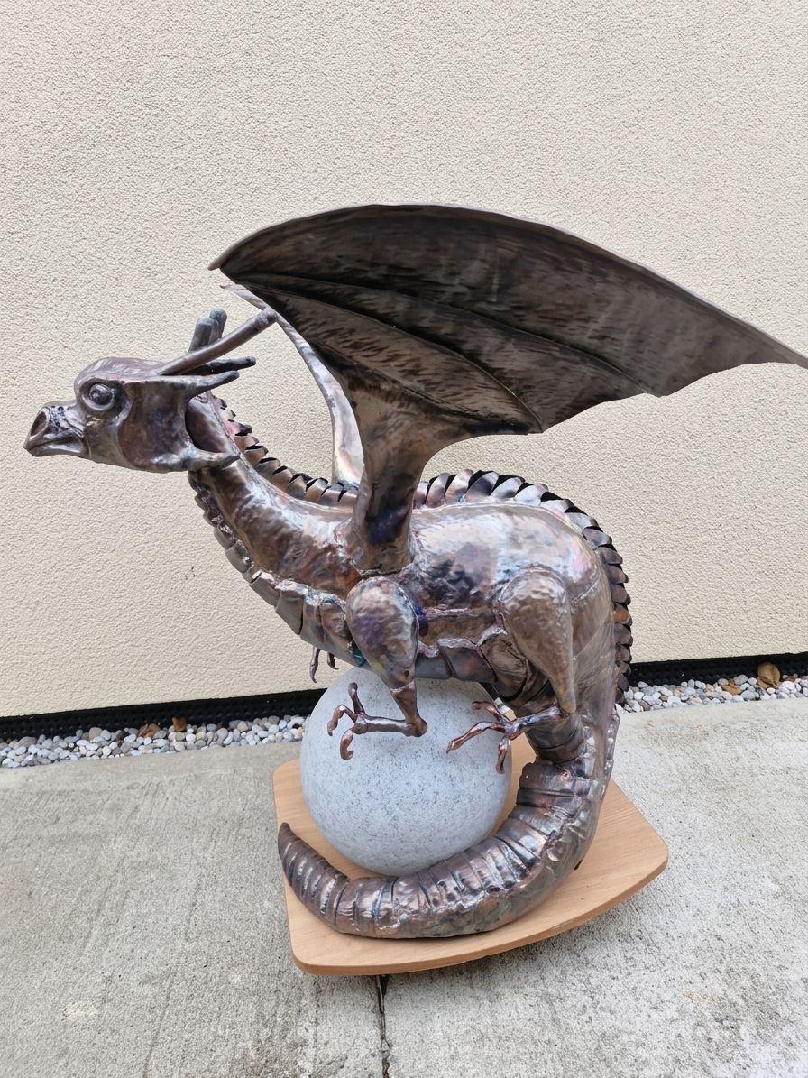 Dragon sculpture on a stone sphere